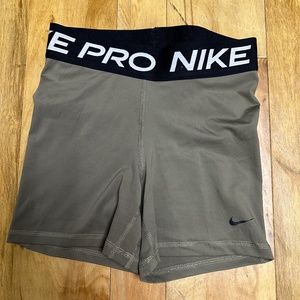 Army green Nike pros
